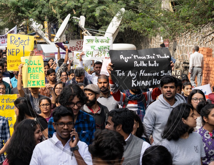 JNU(Jawaharlal Nehru University) students with slogans, demanding withdrawal of 'National Education Policy 2019' and protesting against fee hike and other issues related to Education during a protest towards parliament