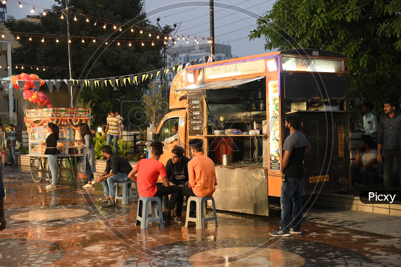 Food Vehicles With Crowd Eating food