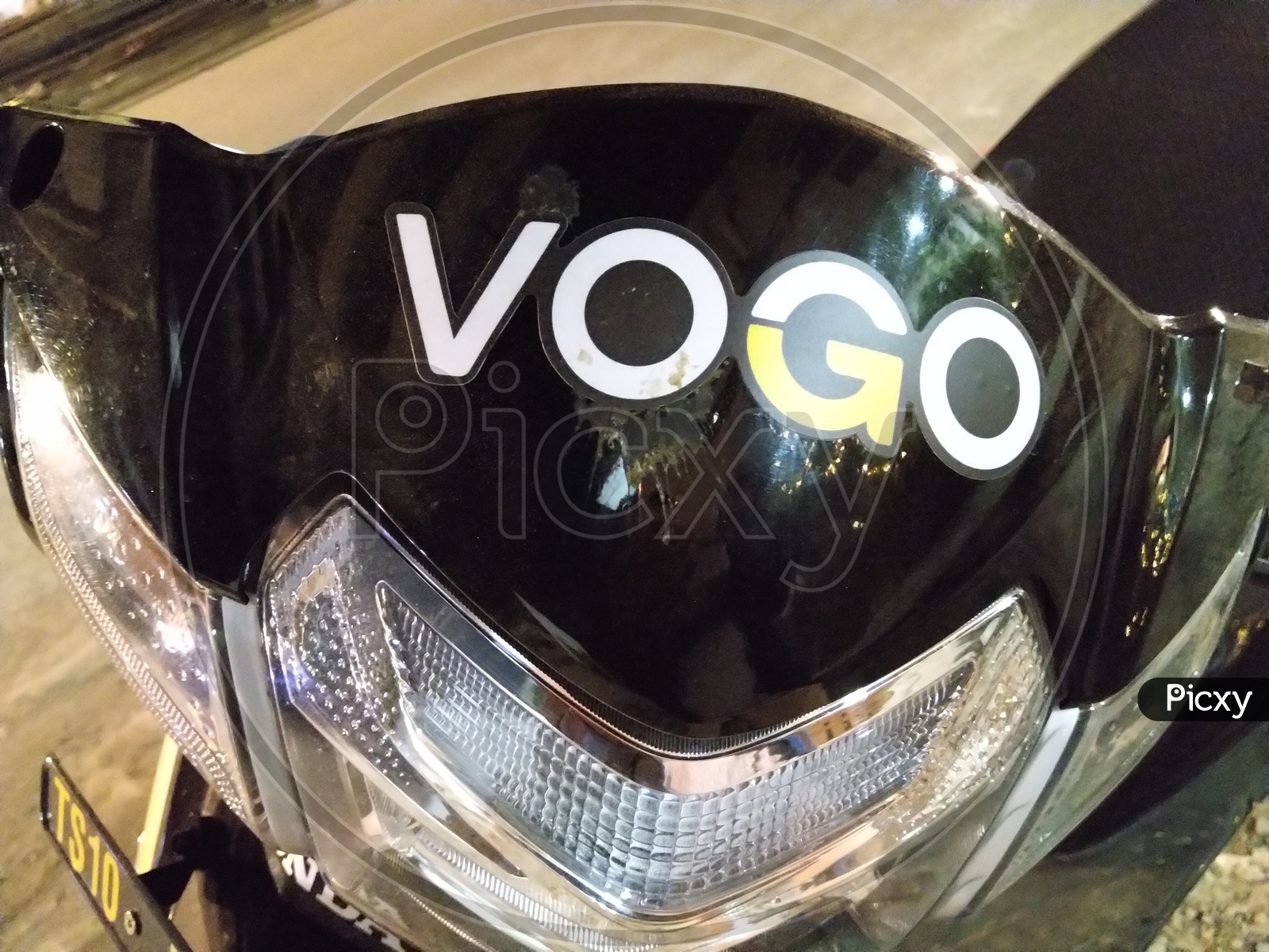 Closeup Shot of Vogo Logo, Vogo Bike Rentals