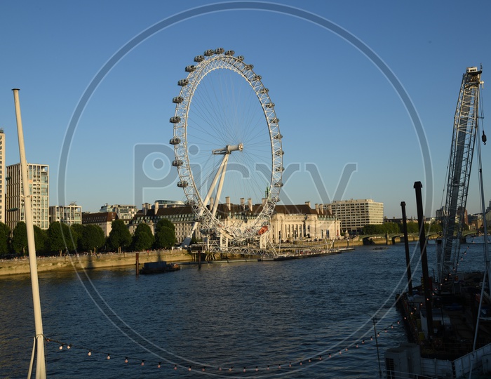 The Coca-Cola London Eye or The Millennium Wheel Or London Eye With River Thames