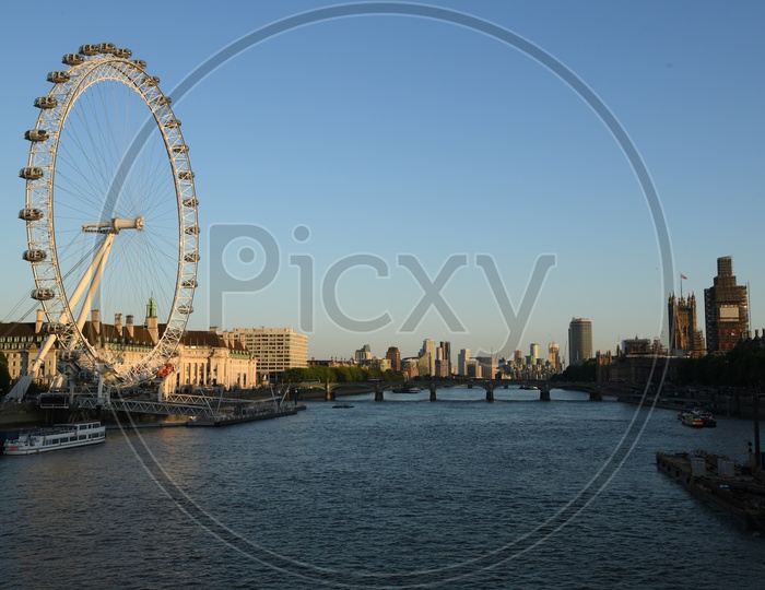 The Coca-Cola London Eye or The Millennium Wheel Or London Eye With River Thames