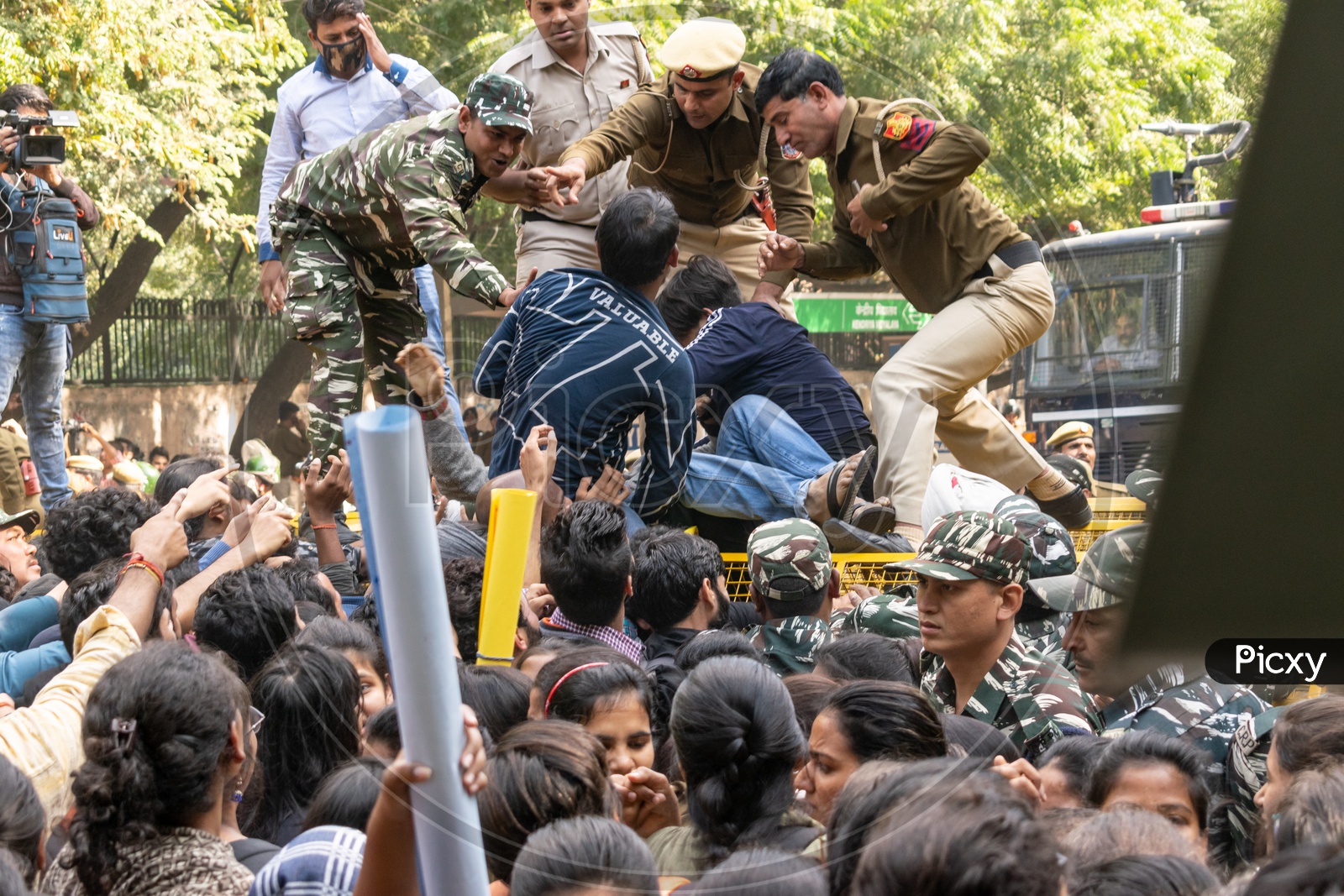 JNU(Jawaharlal Nehru University) students protesting against fee hike, 'National Education Policy 2019' (NEP) and other issues related to Education during a march to parliament and Delhi police personnel and CRPF Jawans trying to stop them