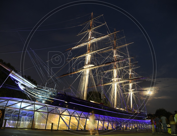 Barquentine  Sailor Ship With Neon Lights in Night Backdrop