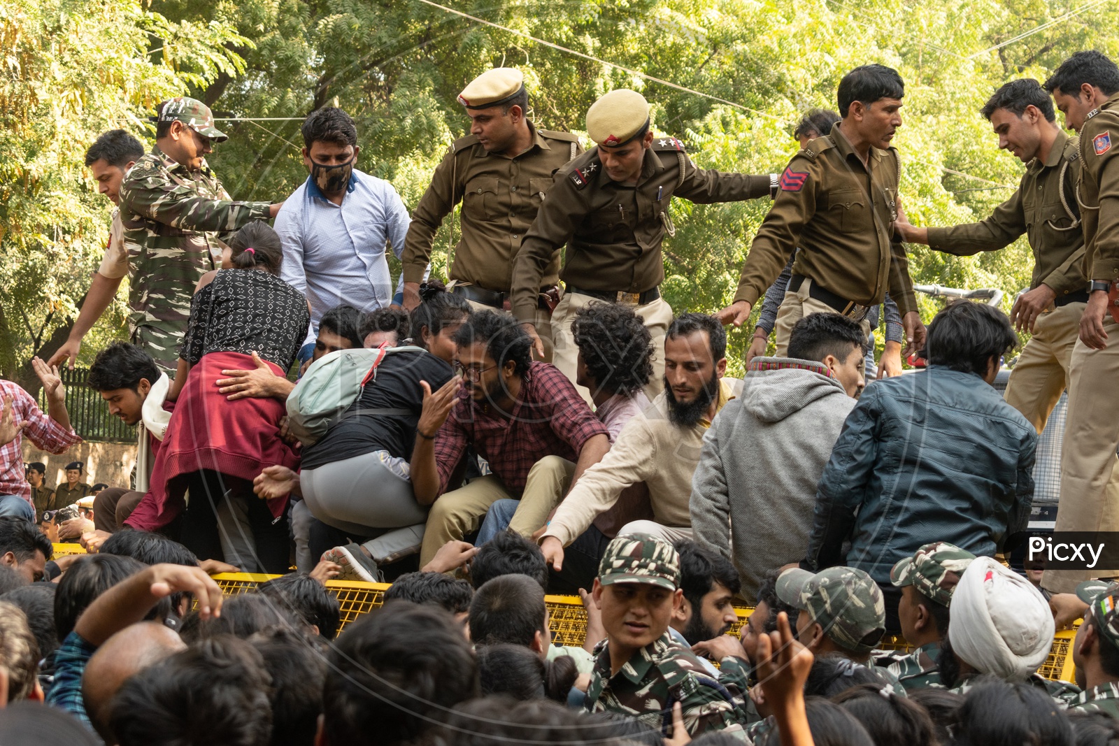 JNU(Jawaharlal Nehru University) students protesting against fee hike, 'National Education Policy 2019' (NEP) and other issues related to Education during a march to parliament and Delhi police personnel and CRPF Jawans trying to stop them