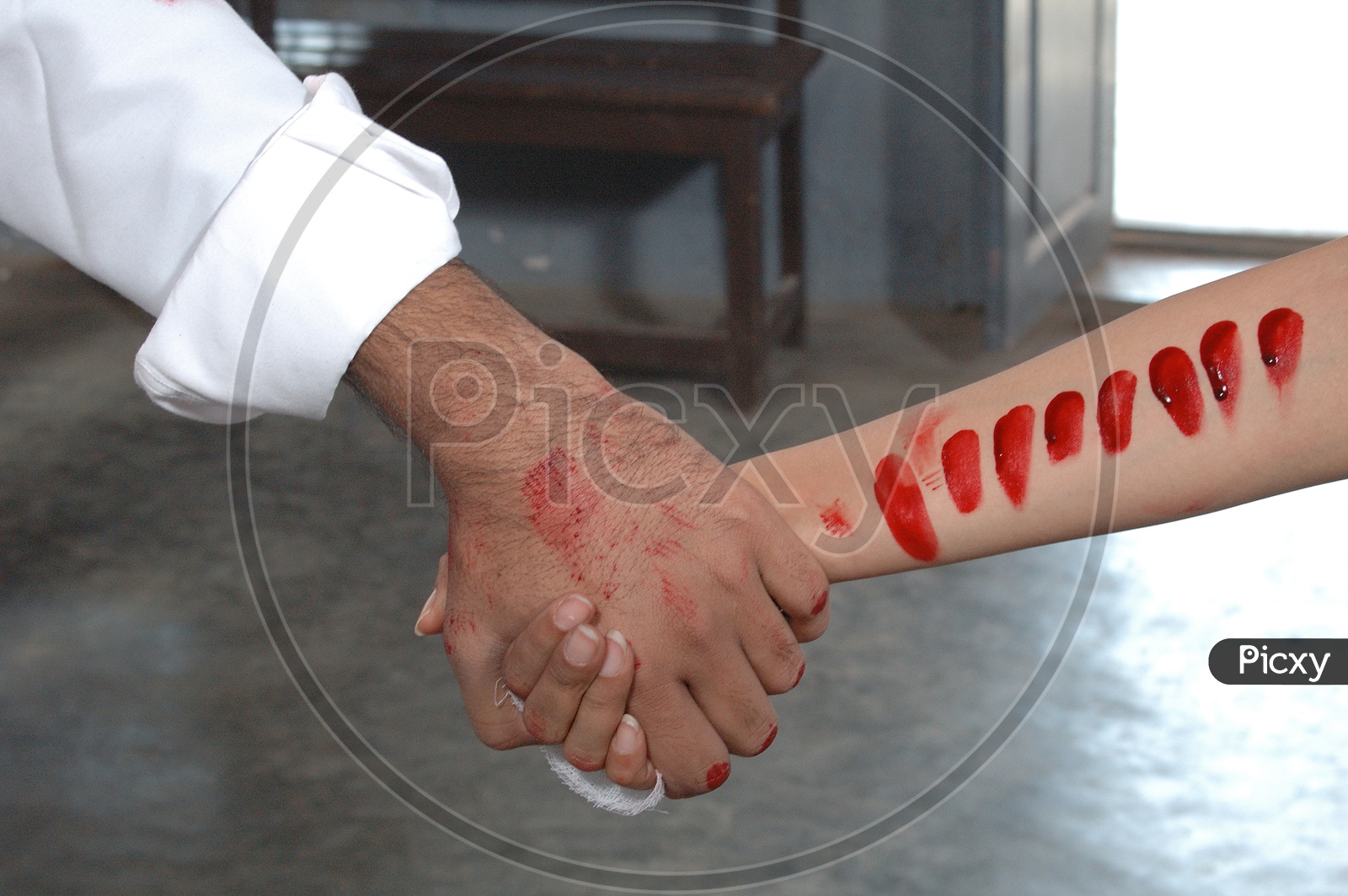 Lovers Couple Holding Hands Each other Closeup  With Blood Stains