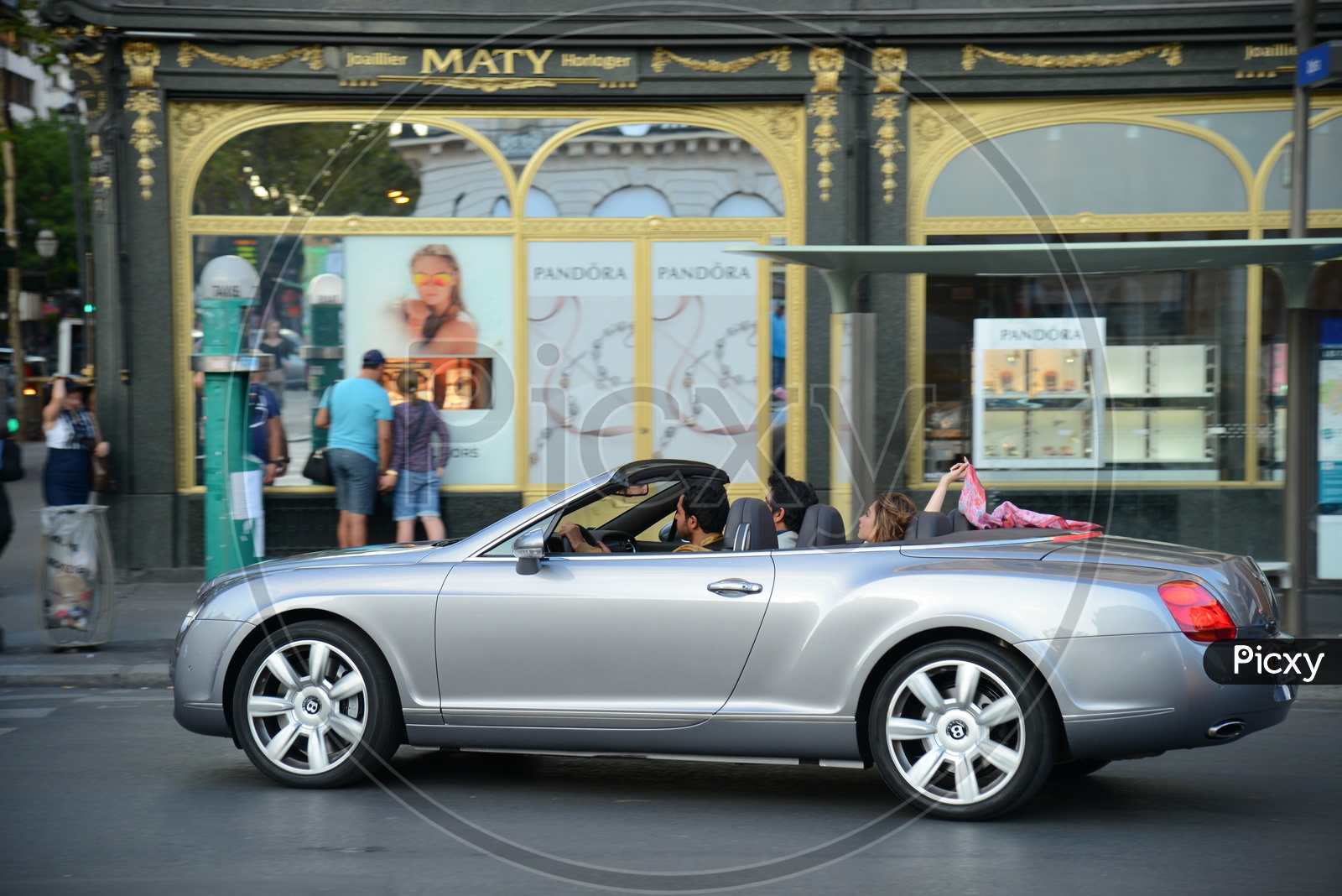 Luxury Cars Running On 38th Avenue , De LOpera Paris