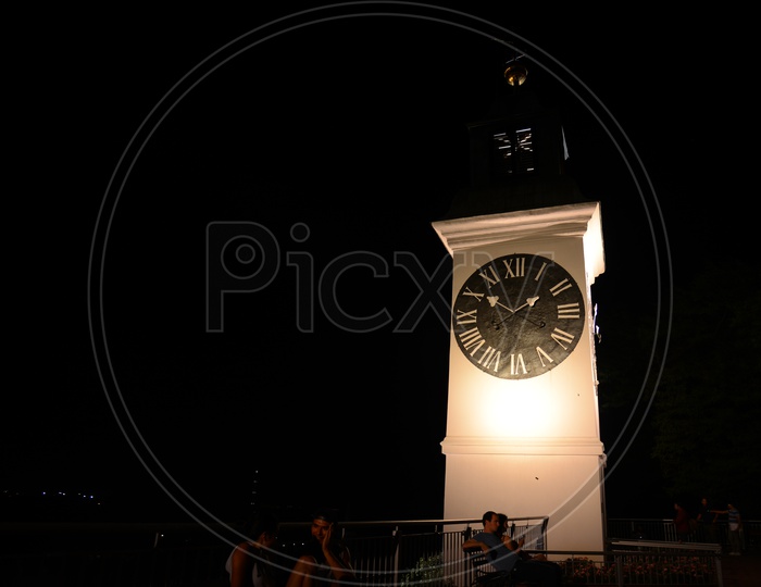 Tower Clock In Night Lights  In Paris