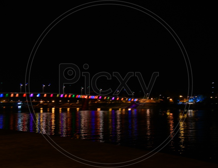 Seine River And a Bridge  Over River Channel in Night Lights