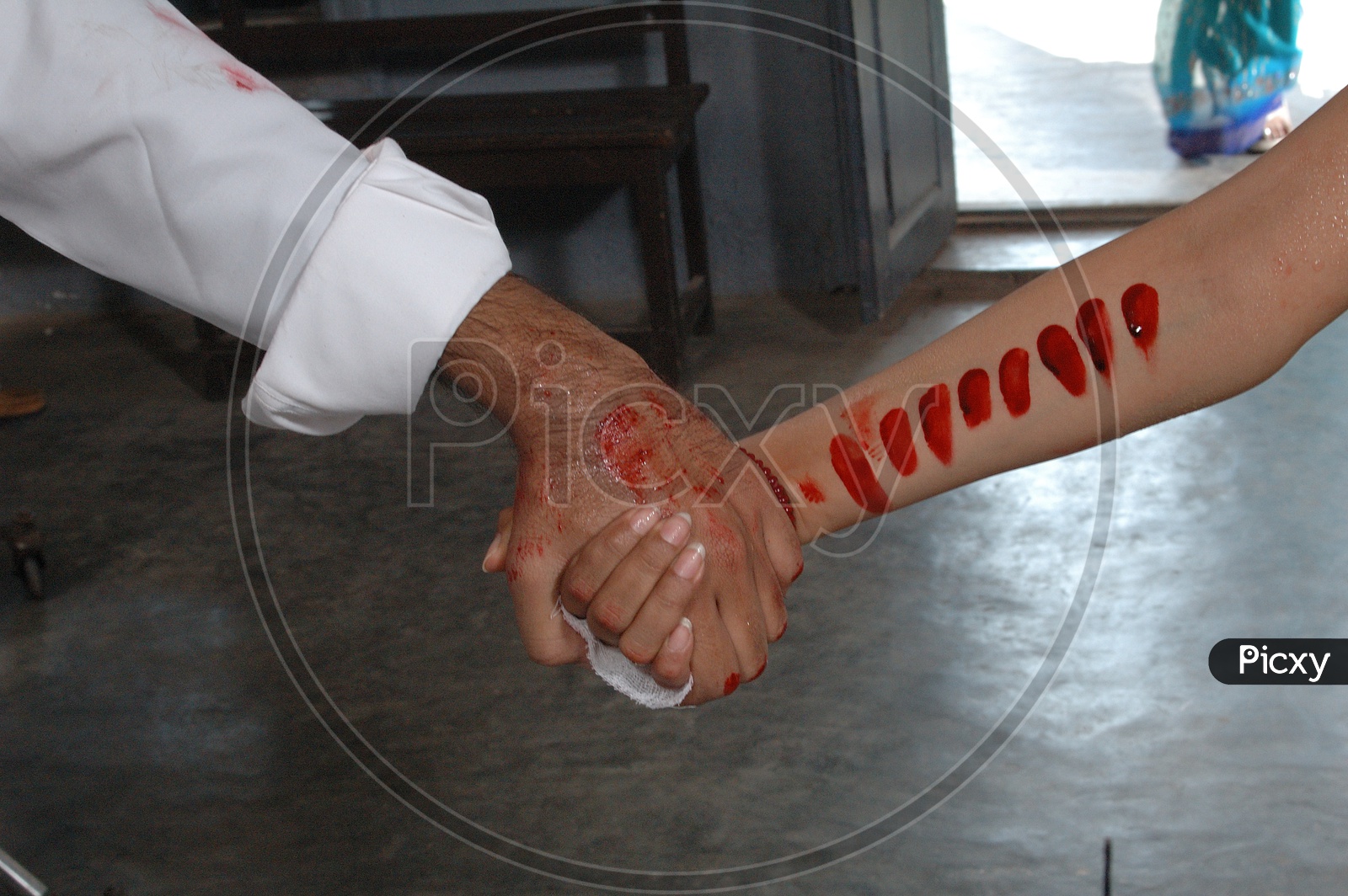 Lovers Couple Holding Hands Each other Closeup  With Blood Stains