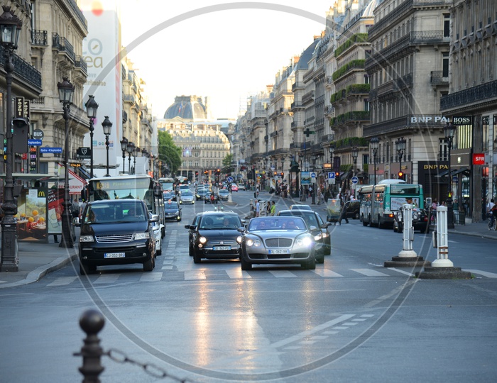Luxury Cars Running On 38th Avenue , De LOpera Paris