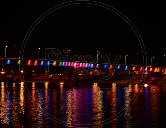 Seine River With Bridge Over It in night View With Color Neon Lights