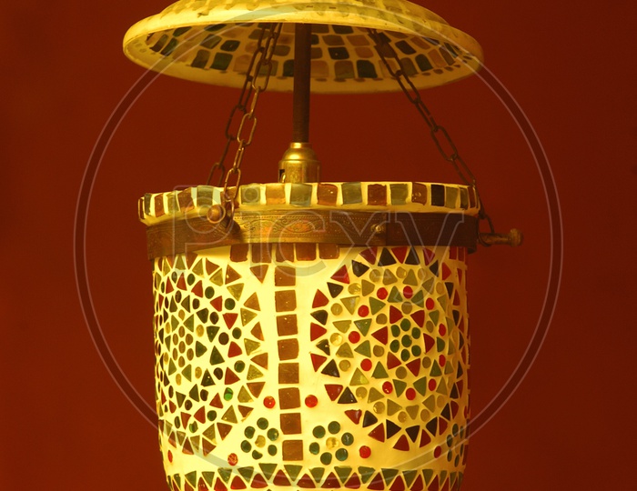 Hanging Lamp Over a Wall Background