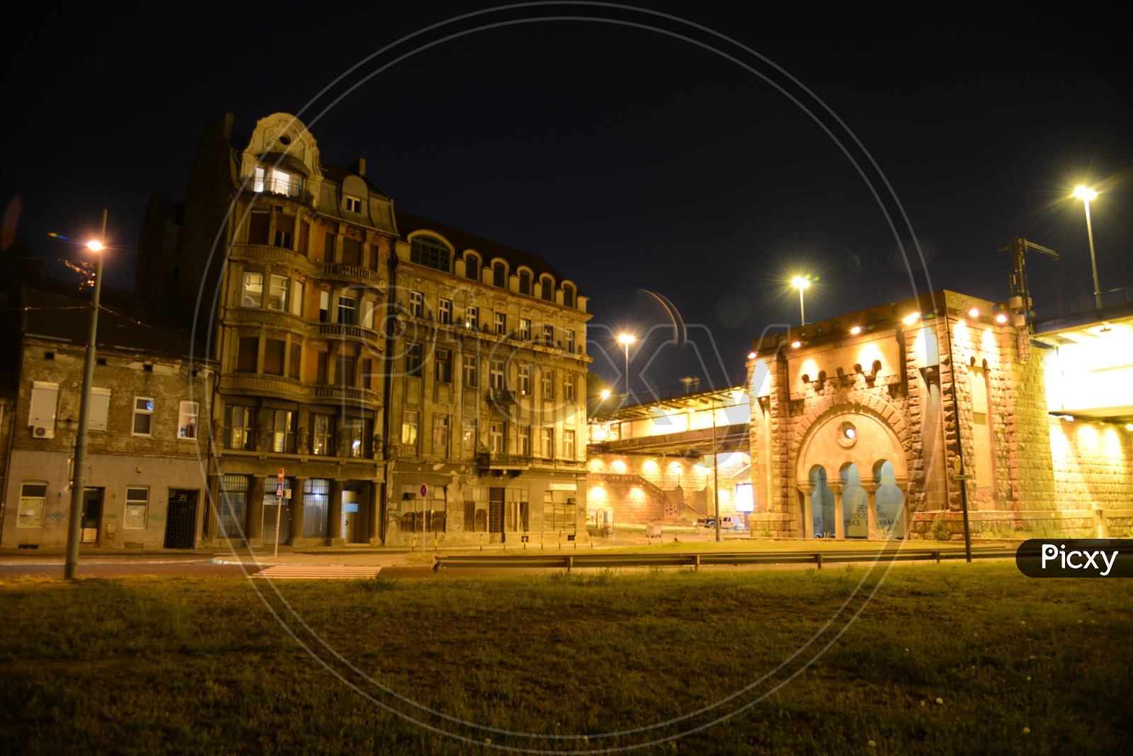 image-of-a-view-of-an-old-building-with-lights-at-night-time-in-paris