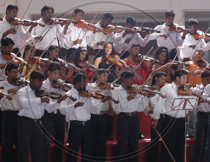 Band Playing Violin As a Group