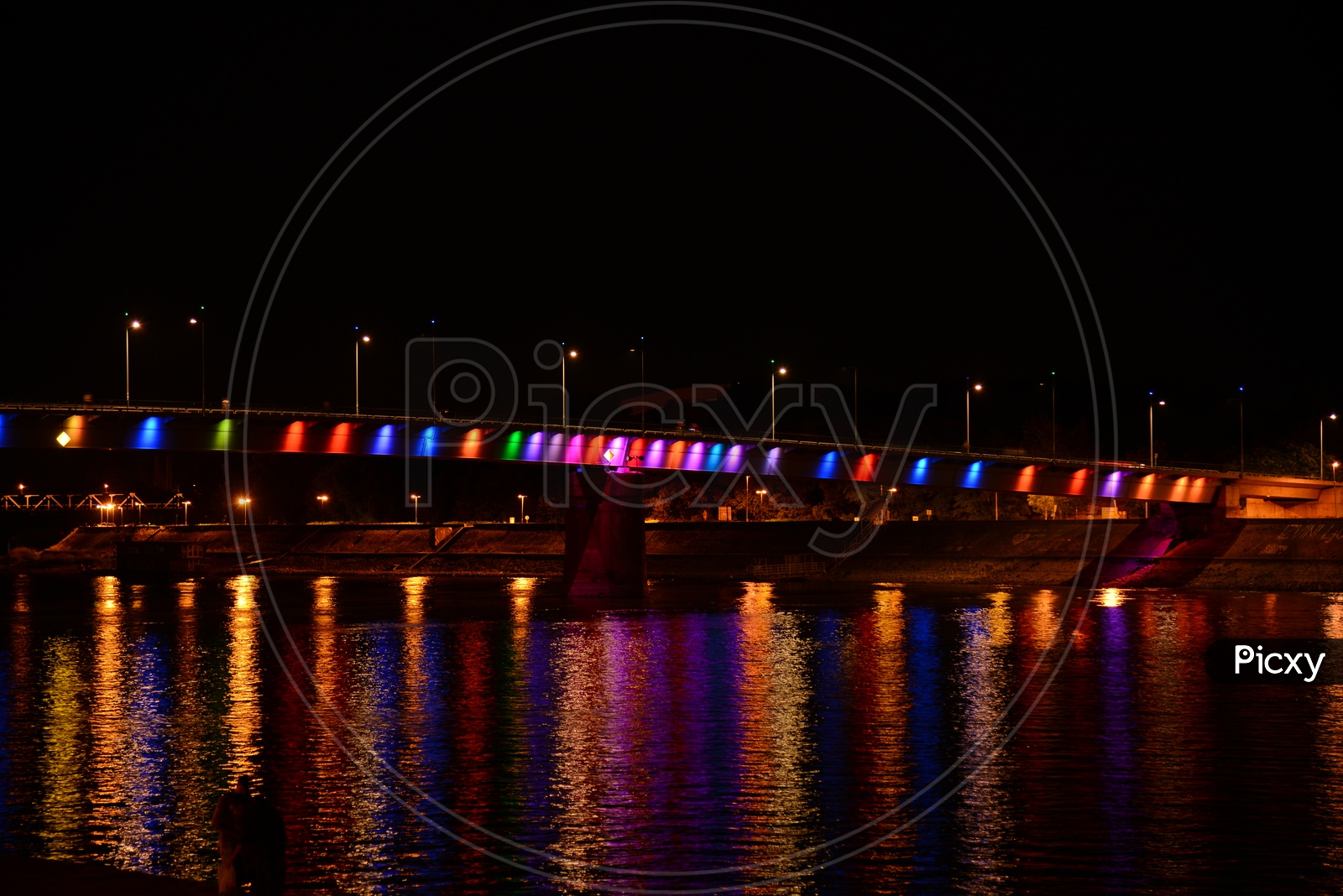Seine River With Bridge Over It in night View With Color Neon Lights