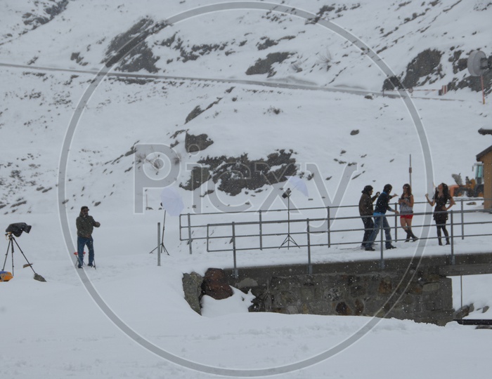 Movie Shooting Crew in Snow Filled Mountains