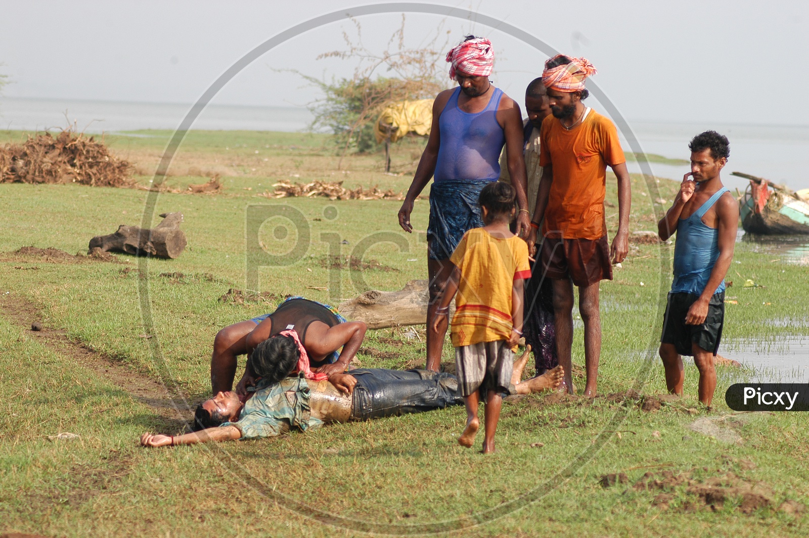 Fisherman Rescuing A Drowned Man From Godavari River