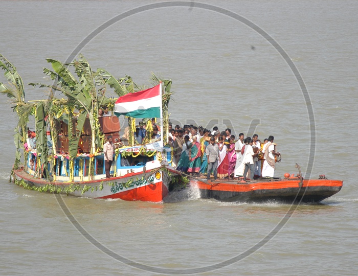 Villagers Commuting in Boats Or Steamer Boats on River Godavari