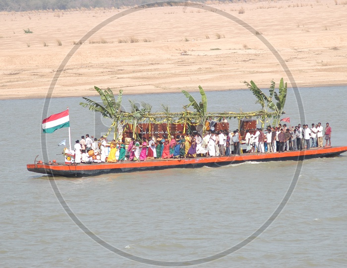 People traveling on Boat in Godavari River to Bhadrachalam Temple