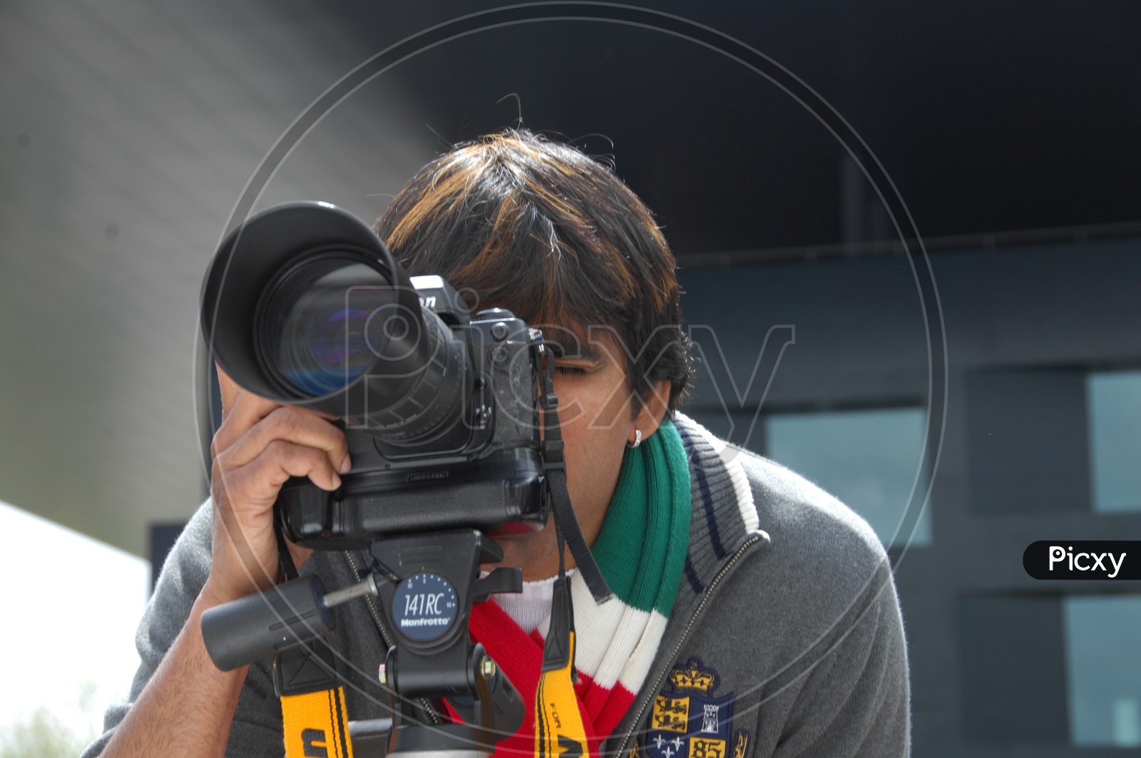 Tollywood Actor Ravi Teja With a DSLR  Camera In  Movie Working Stills