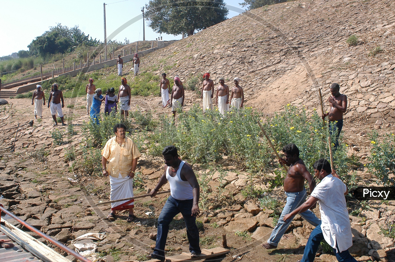 People on a River Bank of Godavari In Movie Working Stills