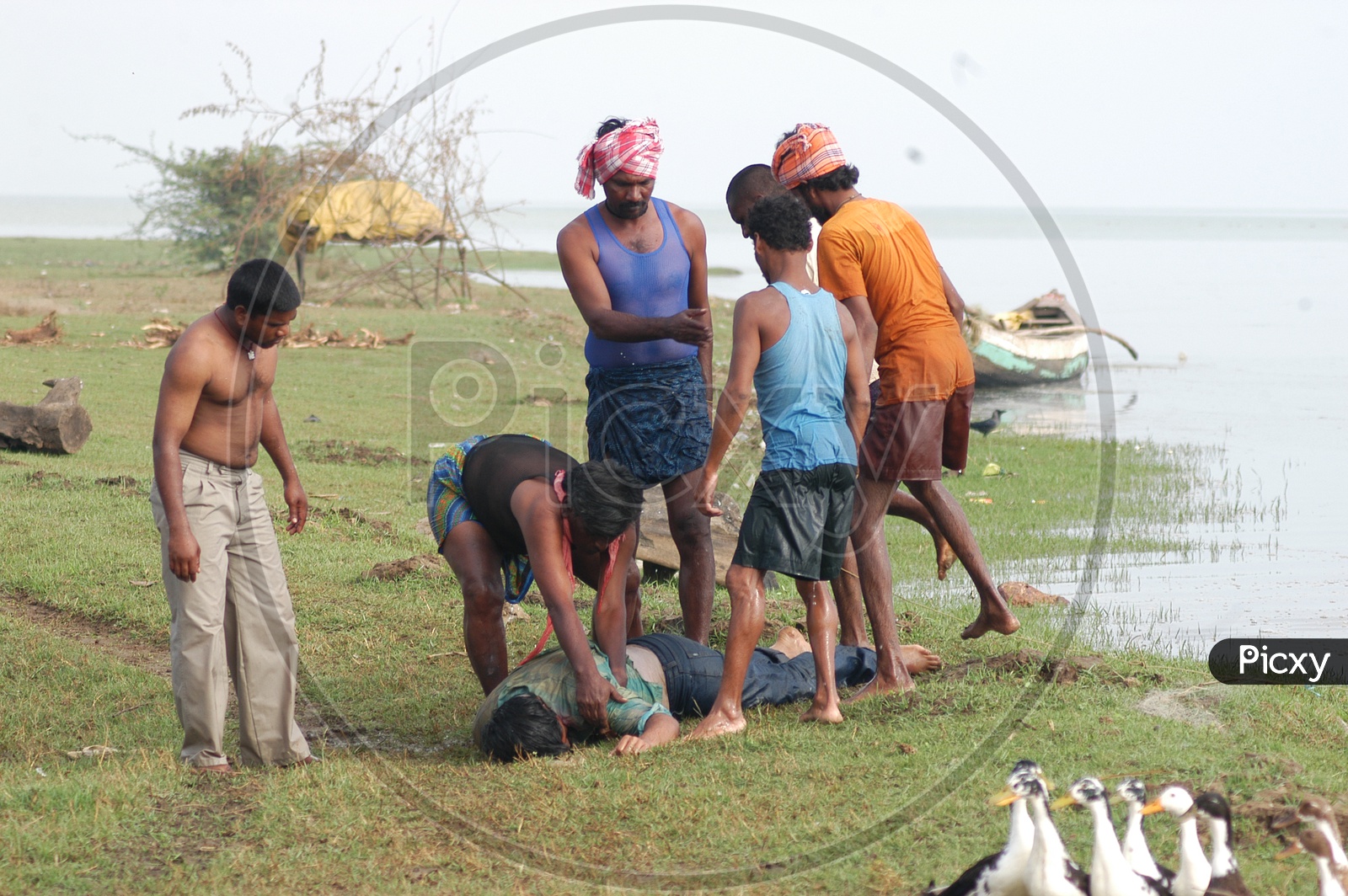 Fisherman Rescuing A Drowned Man From Godavari River