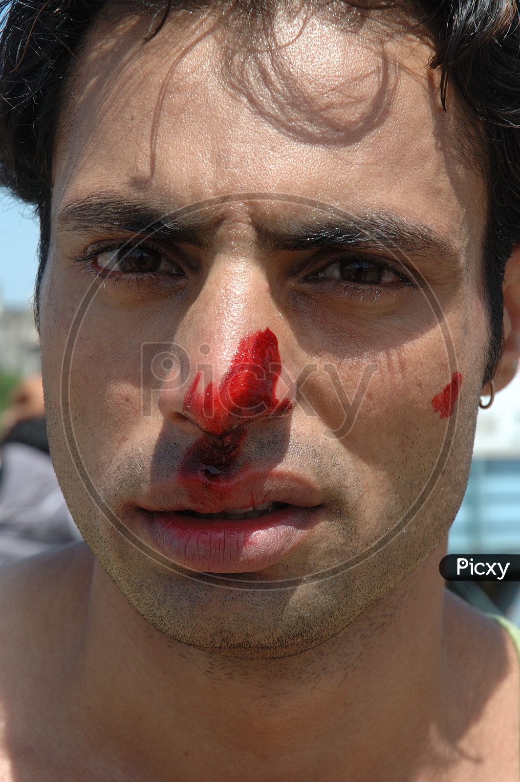 Man With Blood Stains on Face