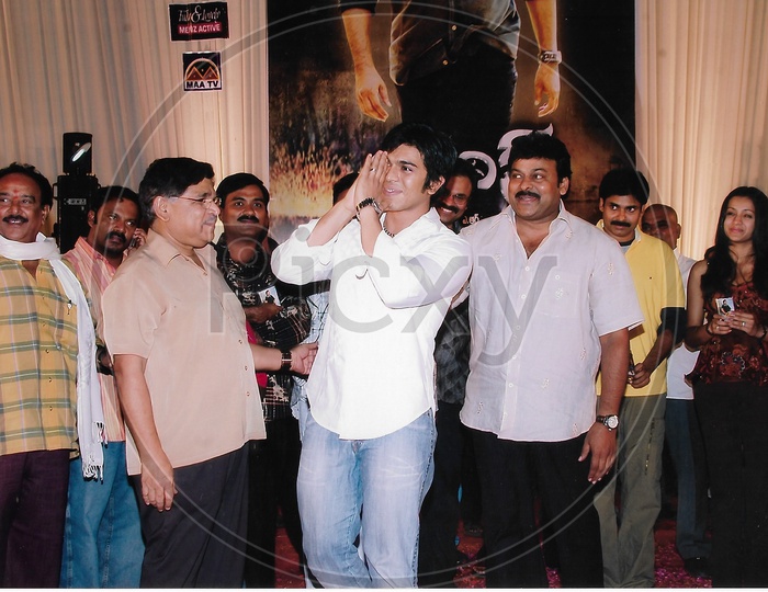 Telugu Film Actor Chiranjeevi and Ram Charan in a Movie Function