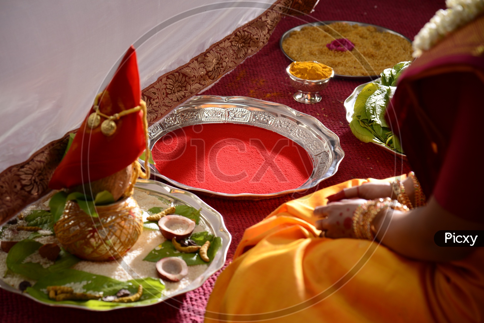 Kumkum And  Turmeric Plates In an Indian Wedding