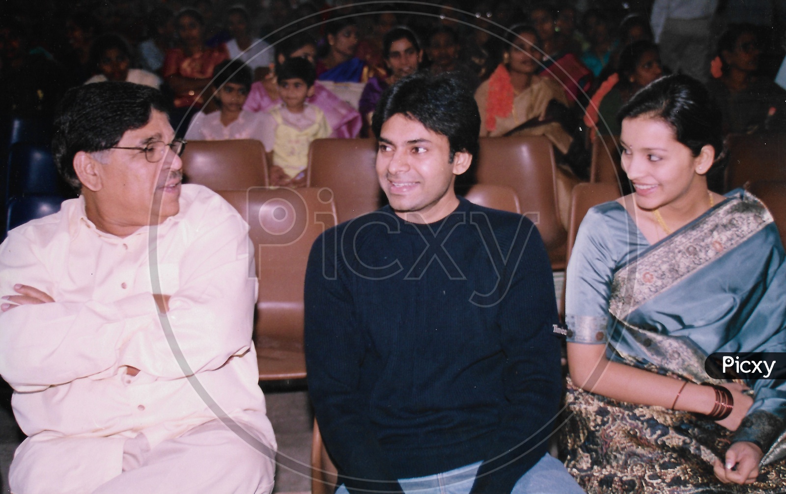 Telugu Film Producer Allu Aravind with Pawan Kalyan and Renu Desai