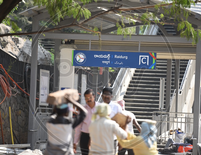 Construction Workers Speeding up the Unfinished Works at Raidurg Metro Station which is supposed to be on 29th November 2019