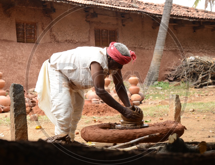 Potter Making Clay Pots At a Rural Village