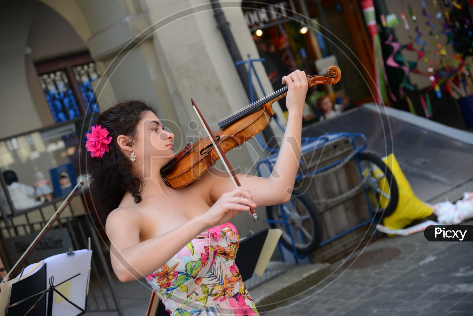 A Street Artist Playing Violin On Paris Streets