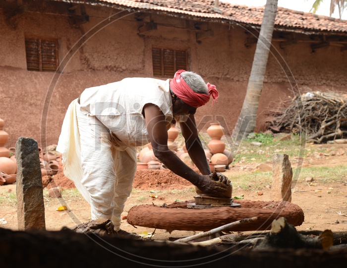 Potter Making Clay Pots At a Rural Village