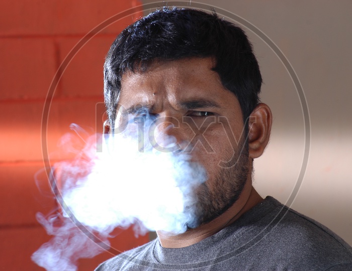 Man Smoking a cigarrate