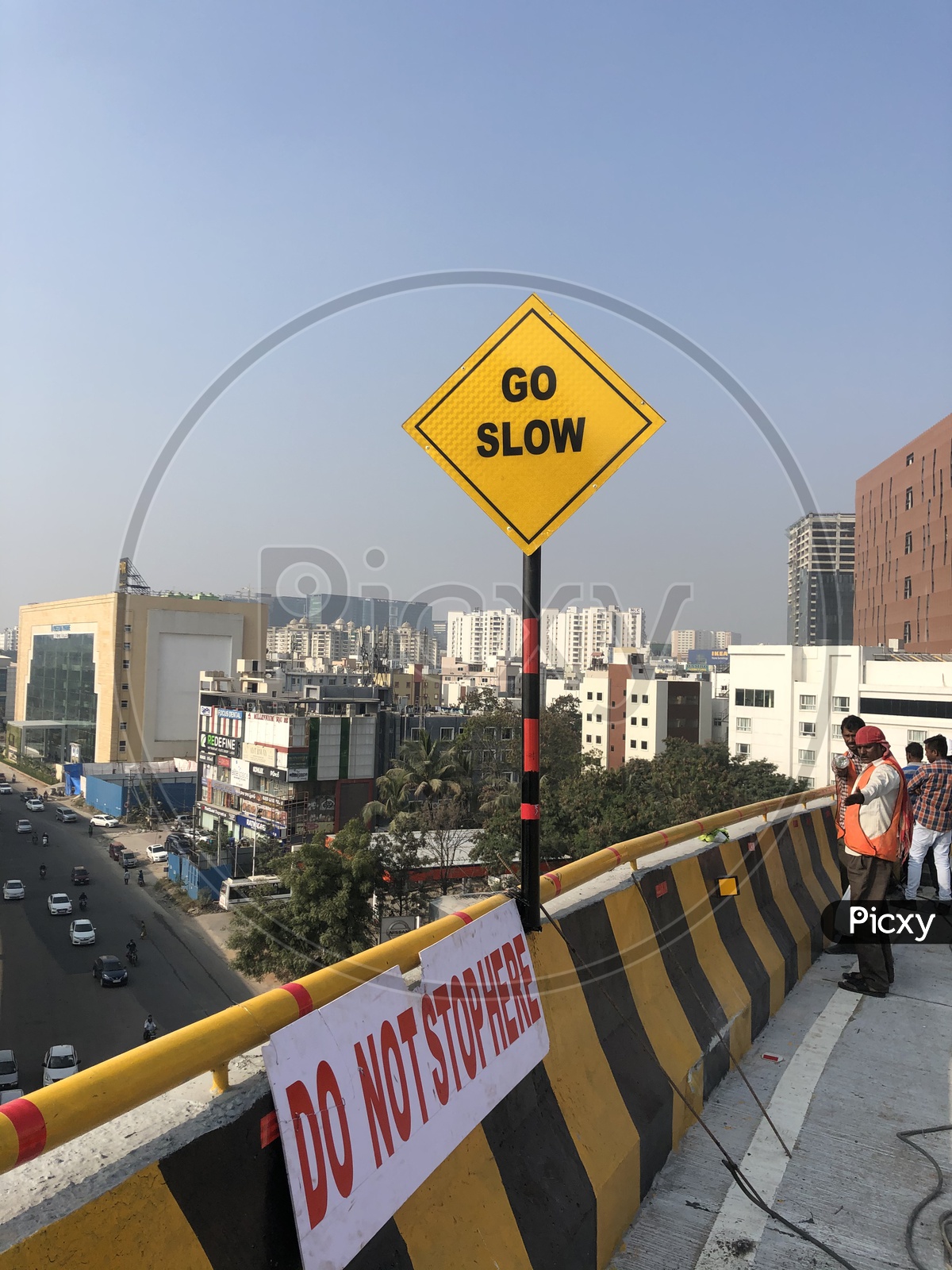 Go Slow Caution Traffic Sign Board on Biodiversity Flyover
