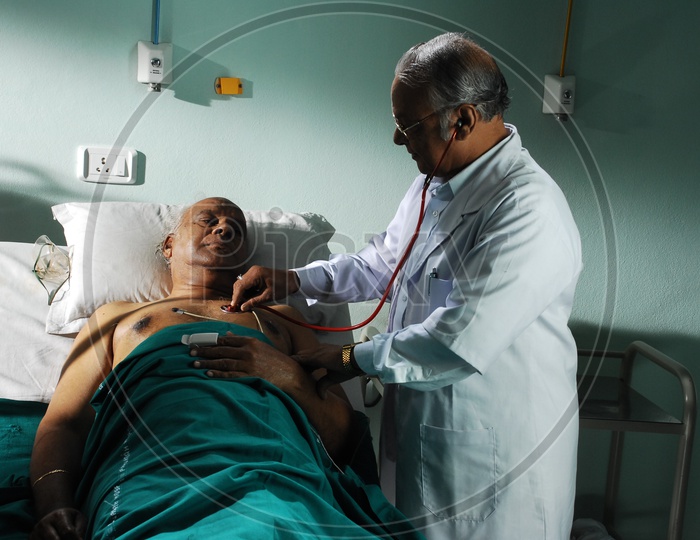 A Doctor Treating Patient in Hospital