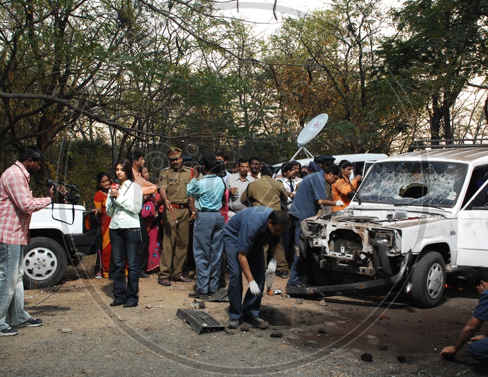 Image Of Police Officers And Forensic Department Inspecting The Car ...