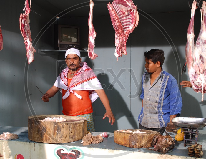 Butcher In a Meat Vending Stall In India