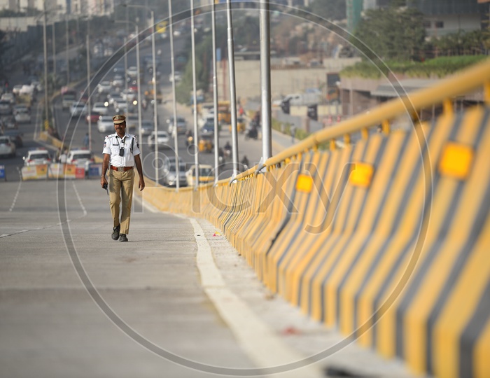 A Traffic Police walking on Newly Constructed Biodiversity Flyover which is temporarily closed for Public, 25th November 2019