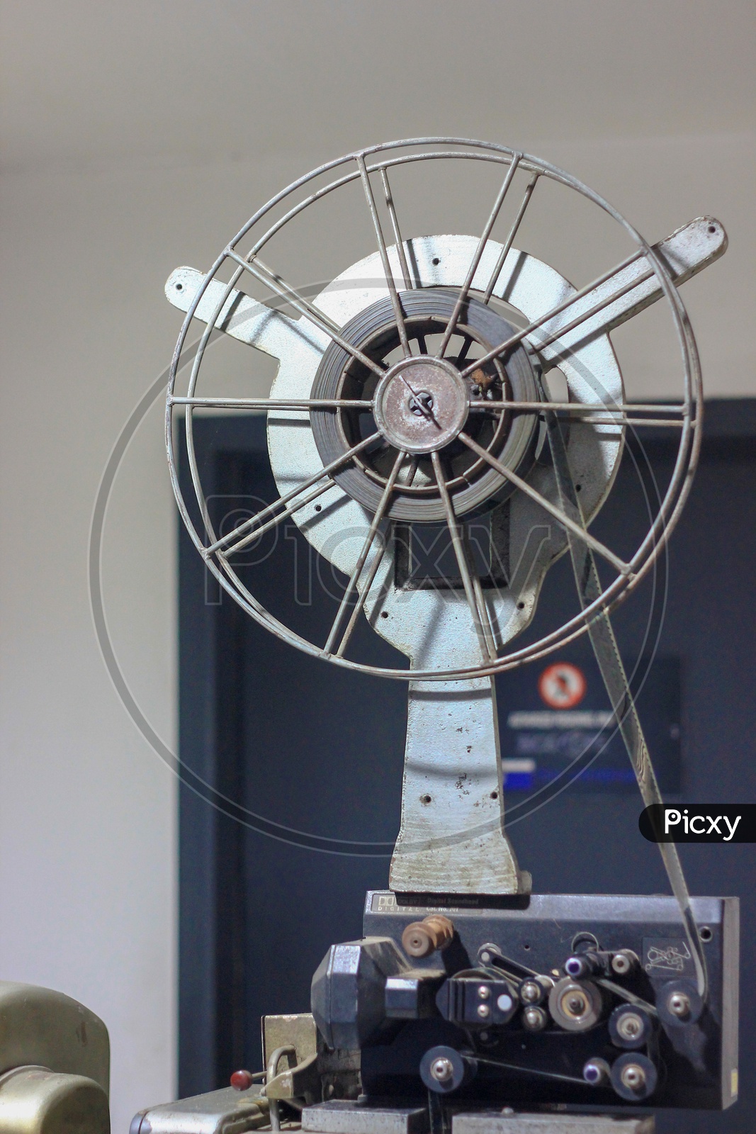 Image of Vintage Film Reel Movie Projector Wheel Closeup-JO735171-Picxy