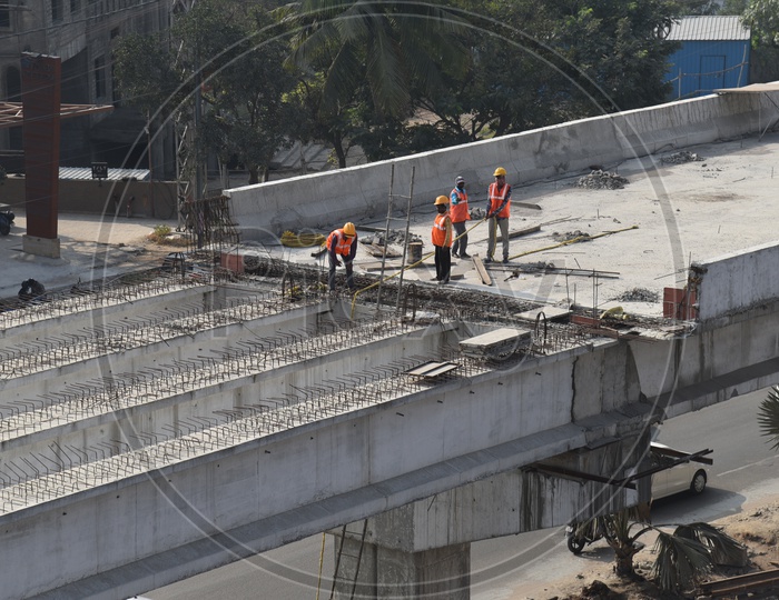 Under Construction Biodiversity Flyover 2 Connecting Gachibowli And Raidurgam in Hyderabad City With Construction Workers