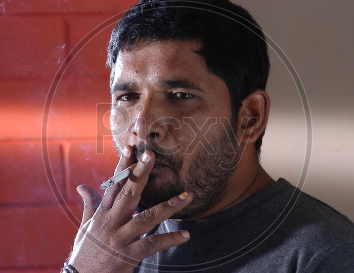 Man Smoking a cigarrate