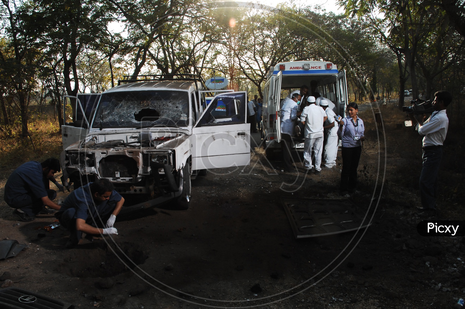 Image Of Police Officers And Forensic Department Inspecting The Car ...