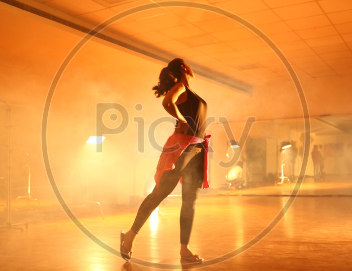 Young Woman  Practicing Dance At a Floor