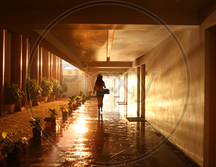 Modern Woman Walking  on a Corridor