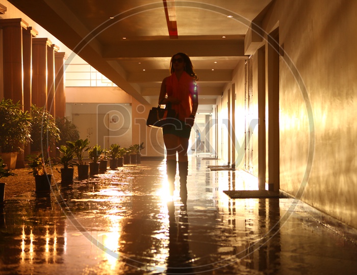 Modern Woman Walking  on a Corridor