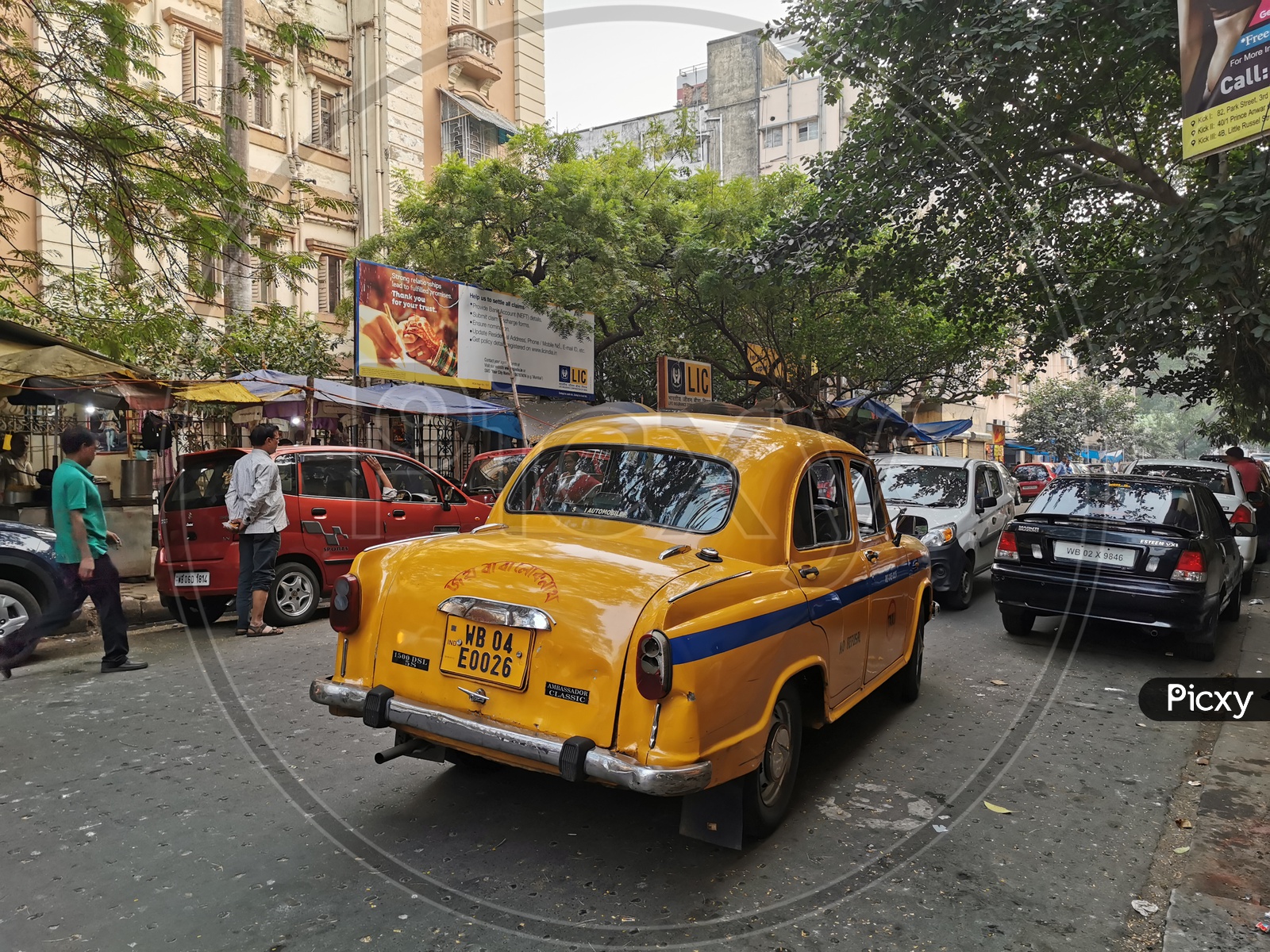 Yellow Taxi In Kolkata City Roads
