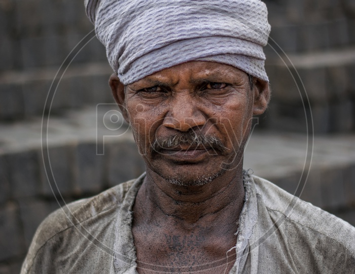 Portrait of a brick klin worker