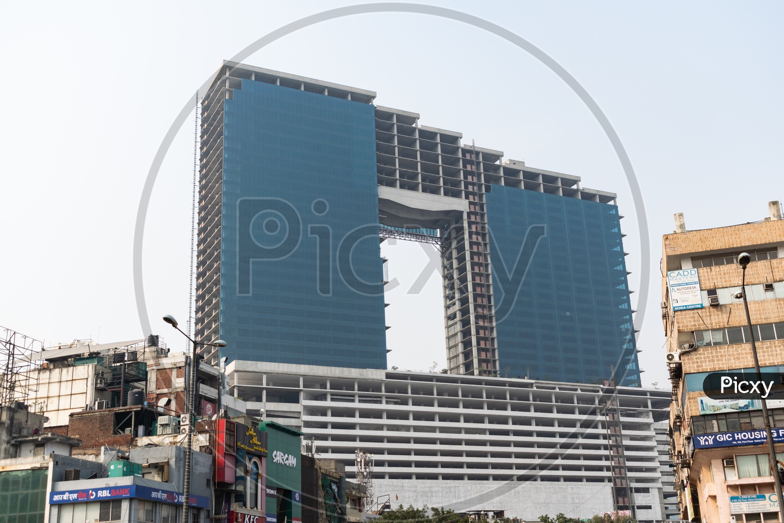 Wave one noida mall construction, other commercial building nearby